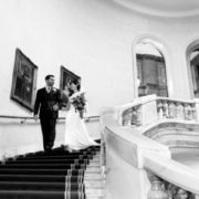 Bride and groom walking down the stairs