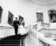 Bride and groom walking down the stairs