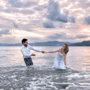 Wedding couple having fun in the sea